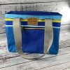 Blue Tote with Aqua Accents: Green Lining, Complemented by a Sleek Grey Strap